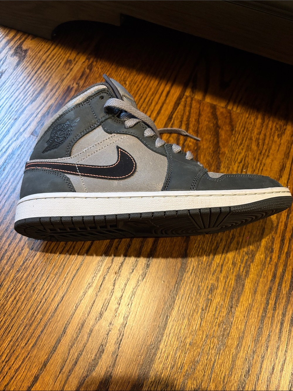 Nike Air Jordan 1 Mid Gray and Black with Orange Stitching